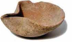 Simple clay lamps like this one were used in common households that surrounded the royal palace at Knossos.